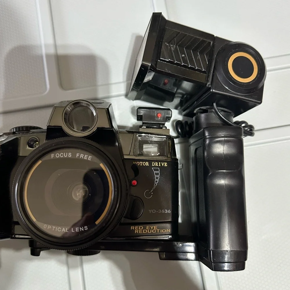 Vintage Canon Motor Drive Red Eye Reduction Black Camera with flash